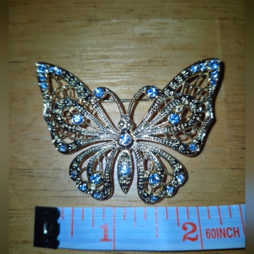 Elegant Gold and Blue‎ Butterfly Brooch with Filigree Design